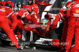 27.03.2011 Melbourne, Australia,  Fernando Alonso (ESP), Scuderia Ferrari pit stop - Formula 1 World Championship, Rd 01, Australian Grand Prix, Sunday Race