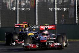 27.03.2011 Melbourne, Australia,  Jenson Button (GBR), McLaren Mercedes and Sebastian Vettel (GER), Red Bull Racing  - Formula 1 World Championship, Rd 01, Australian Grand Prix, Sunday Race