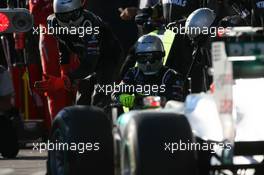 27.03.2011 Melbourne, Australia,  Michael Schumacher (GER), Mercedes GP Petronas F1 Team pit stop - Formula 1 World Championship, Rd 01, Australian Grand Prix, Sunday Race