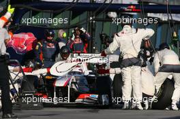 27.03.2011 Melbourne, Australia,  Kamui Kobayashi (JAP), Sauber F1 Team pit stop - Formula 1 World Championship, Rd 01, Australian Grand Prix, Sunday Race