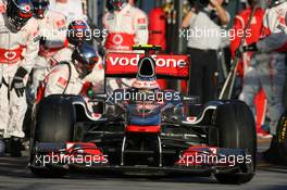 27.03.2011 Melbourne, Australia,  Jenson Button (GBR), McLaren Mercedes pit stop - Formula 1 World Championship, Rd 01, Australian Grand Prix, Sunday Race