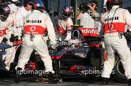 27.03.2011 Melbourne, Australia,  Jenson Button (GBR), McLaren Mercedes pit stop - Formula 1 World Championship, Rd 01, Australian Grand Prix, Sunday Race