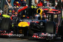 27.03.2011 Melbourne, Australia,  Sebastian Vettel (GER), Red Bull Racing pit stop - Formula 1 World Championship, Rd 01, Australian Grand Prix, Sunday Race