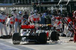 27.03.2011 Melbourne, Australia,  Jenson Button (GBR), McLaren Mercedes pit stop - Formula 1 World Championship, Rd 01, Australian Grand Prix, Sunday Race