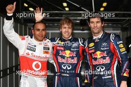 26.03.2011 Melbourne, Australia,  pole position for Sebastian Vettel (GER), Red Bull Racing, 2nd for Lewis Hamilton (GBR), McLaren Mercedes and 3rd for Mark Webber (AUS), Red Bull Racing - Formula 1 World Championship, Rd 01, Australian Grand Prix, Saturday Qualifying