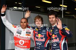 26.03.2011 Melbourne, Australia,  pole position for Sebastian Vettel (GER), Red Bull Racing, 2nd for Lewis Hamilton (GBR), McLaren Mercedes and 3rd for Mark Webber (AUS), Red Bull Racing - Formula 1 World Championship, Rd 01, Australian Grand Prix, Saturday Qualifying