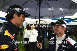 24.03.2011 Melbourne, Australia,  Mark Webber (AUS), Red Bull Racing and Rubens Barrichello (BRA), AT&T Williams - Formula 1 World Championship, Rd 01, Australian Grand Prix, Thursday