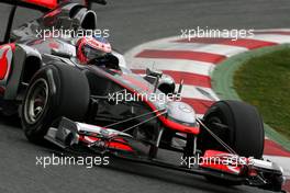 08.03.2011 Barcelona, Spain,  Jenson Button (GBR), McLaren Mercedes using a test front wing  - Formula 1 Testing - Formula 1 World Championship