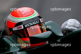 09.03.2011 Barcelona, Spain,  Jarno Trulli (ITA), Team Lotus, uses the new Bell helmet with the carbon part on top of the visor, new 2011 FIA helmet regulation - Formula 1 Testing - Formula 1 World Championship