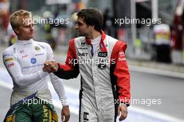 26.08.2011 Spa Francorchamps, Belgium,  Heikki Kovalainen (FIN), Team Lotus and Jerome d'Ambrosio (BEL), Virgin Racing  - Formula 1 World Championship, Rd 12, Belgian Grand Prix, Friday Practice