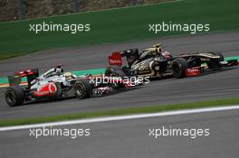 28.08.2011 Spa Francorchamps, Belgium,  Lewis Hamilton (GBR), McLaren Mercedes and Vitaly Petrov (RUS), Lotus Renault GP - Formula 1 World Championship, Rd 12, Belgian Grand Prix, Sunday Race