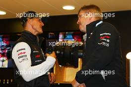 27.08.2011 Spa Francorchamps, Belgium,  Michael Schumacher (GER), Mercedes GP Petronas F1 Team celebrates his first F1 drive at Spa 20 years ago with Ross Brawn (GBR) Team Principal, Mercedes GP Petronas  - Formula 1 World Championship, Rd 12, Belgian Grand Prix, Saturday