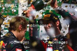 27.11.2011 Sao Paulo, Brazil, Sebastian Vettel (GER), Red Bull Racing and Mark Webber (AUS), Red Bull Racing  - Formula 1 World Championship, Rd 19, Brazilian Grand Prix, Sunday Podium