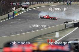 27.11.2011 Interlargos, Brazil,  Felipe Massa (BRA), Scuderia Ferrari makes donuts - Formula 1 World Championship, Rd 19, Brazilian Grand Prix, Sunday Podium