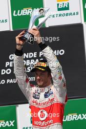 27.11.2011 Sao Paulo, Brazil, Jenson Button (GBR), McLaren Mercedes  - Formula 1 World Championship, Rd 19, Brazilian Grand Prix, Sunday Podium