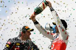 27.11.2011 Interlargos, Brazil,  Mark Webber (AUS), Red Bull Racing and Jenson Button (GBR), McLaren Mercedes  - Formula 1 World Championship, Rd 19, Brazilian Grand Prix, Sunday Podium