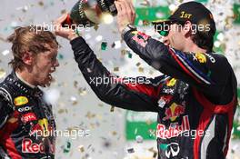 27.11.2011 Sao Paulo, Brazil, Sebastian Vettel (GER), Red Bull Racing and Mark Webber (AUS), Red Bull Racing  - Formula 1 World Championship, Rd 19, Brazilian Grand Prix, Sunday Podium