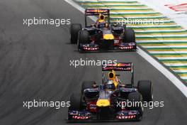 27.11.2011 Sao Paulo, Brazil, Sebastian Vettel (GER), Red Bull Racing leads Mark Webber (AUS), Red Bull Racing  - Formula 1 World Championship, Rd 19, Brazilian Grand Prix, Sunday Race