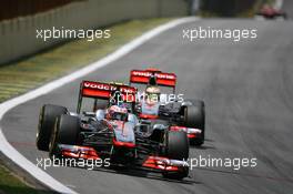 27.11.2011 Sao Paulo, Brazil, Jenson Button (GBR), McLaren Mercedes and Lewis Hamilton (GBR), McLaren Mercedes  - Formula 1 World Championship, Rd 19, Brazilian Grand Prix, Sunday Race