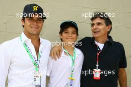26.11.2011 Interlargos, Brazil,  Nelshino Piquet (BRE) and Nelson Piquet (BRE) - Formula 1 World Championship, Rd 19, Brazilian Grand Prix, Saturday