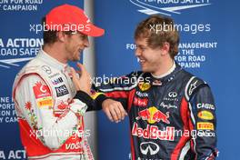 26.11.2011 Sao Paulo, Brazil, Jenson Button (GBR), McLaren Mercedes with Sebastian Vettel (GER), Red Bull Racing gets pole position and the most pole positions in one season  - Formula 1 World Championship, Rd 19, Brazilian Grand Prix, Saturday Qualifying