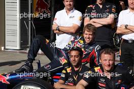 24.11.2011 Sao Paulo, Brazil, Sebastian Vettel (GER), Red Bull Racing with his team  - Formula 1 World Championship, Rd 19, Brazilian Grand Prix, Thursday