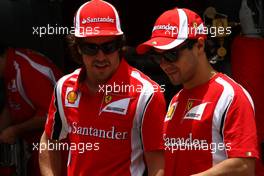 24.11.2011 Sao Paulo, Brazil, Fernando Alonso (ESP), Scuderia Ferrari and Felipe Massa (BRA), Scuderia Ferrari  - Formula 1 World Championship, Rd 19, Brazilian Grand Prix, Thursday