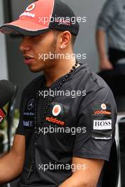 24.11.2011 Sao Paulo, Brazil, Lewis Hamilton (GBR), McLaren Mercedes necklace  - Formula 1 World Championship, Rd 19, Brazilian Grand Prix, Thursday