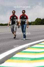 24.11.2011 Sao Paulo, Brazil, Jerome d'Ambrosio (BEL), Marussia Virgin Racing and Robert Wickens  - Formula 1 World Championship, Rd 19, Brazilian Grand Prix, Thursday