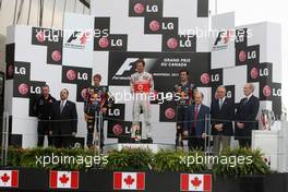 12.06.2011 Montreal, Canada,  Sebastian Vettel (GER), Red Bull Racing,  Jenson Button (GBR), McLaren Mercedes, Mark Webber (AUS), Red Bull Racing - Formula 1 World Championship, Rd 07, Canadian Grand Prix, Sunday Podium