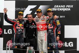 12.06.2011 Montreal, Canada,  Sebastian Vettel (GER), Red Bull Racing,  Jenson Button (GBR), McLaren Mercedes, Mark Webber (AUS), Red Bull Racing - Formula 1 World Championship, Rd 07, Canadian Grand Prix, Sunday Podium