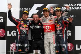 12.06.2011 Montreal, Canada,  Sebastian Vettel (GER), Red Bull Racing,  Jenson Button (GBR), McLaren Mercedes, Mark Webber (AUS), Red Bull Racing - Formula 1 World Championship, Rd 07, Canadian Grand Prix, Sunday Podium