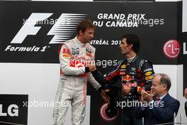 12.06.2011 Montreal, Canada,  Jenson Button (GBR), McLaren Mercedes, Mark Webber (AUS), Red Bull Racing - Formula 1 World Championship, Rd 07, Canadian Grand Prix, Sunday Podium