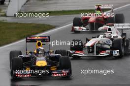 12.06.2011 Montreal, Canada,  Sebastian Vettel (GER), Red Bull Racing leads Kamui Kobayashi (JAP), Sauber F1 Team - Formula 1 World Championship, Rd 07, Canadian Grand Prix, Sunday Race