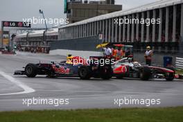 12.06.2011 Montreal, Canada,  Mark Webber (AUS), Red Bull Racing and Lewis Hamilton (GBR), McLaren Mercedes crash - Formula 1 World Championship, Rd 07, Canadian Grand Prix, Sunday Race