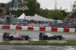 12.06.2011 Montreal, Canada,  Michael Schumacher (GER), Mercedes GP Petronas F1 Team leads Lewis Hamilton (GBR), McLaren Mercedes - Formula 1 World Championship, Rd 07, Canadian Grand Prix, Sunday Race