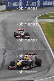 12.06.2011 Montreal, Canada, Sebastian Vettel (DEU) Red Bull Racing, Jenson Button  (GBR) Vodafone McLaren Mercedes - Formula 1 World Championship, Rd 7, Canadian Grand Prix, Sunday Race