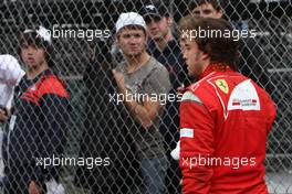 12.06.2011 Montreal, Canada,  Fernando Alonso (ESP), Scuderia Ferrari walks back to the pits - Formula 1 World Championship, Rd 07, Canadian Grand Prix, Sunday Race