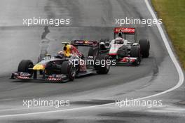 12.06.2011 Montreal, Canada, Mark Webber (AUS) Red Bull Racing, Jenson Button  (GBR) Vodafone McLaren Mercedes - Formula 1 World Championship, Rd 7, Canadian Grand Prix, Sunday Race