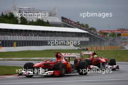 12.06.2011 Montreal, Canada,  Fernando Alonso (ESP), Scuderia Ferrari leads Felipe Massa (BRA), Scuderia Ferrari - Formula 1 World Championship, Rd 07, Canadian Grand Prix, Sunday Race
