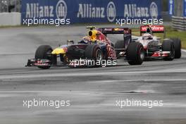 12.06.2011 Montreal, Canada, Mark Webber (AUS) Red Bull Racing, Jenson Button  (GBR) Vodafone McLaren Mercedes - Formula 1 World Championship, Rd 7, Canadian Grand Prix, Sunday Race