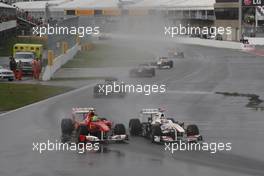 12.06.2011 Montreal, Canada,  Kamui Kobayashi (JAP), Sauber F1 Team and Felipe Massa (BRA), Scuderia Ferrari - Formula 1 World Championship, Rd 07, Canadian Grand Prix, Sunday Race