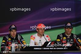 12.06.2011 Montreal, Canada,  Sebastian Vettel (GER), Red Bull Racing with Jenson Button (GBR), McLaren Mercedes and Mark Webber (AUS), Red Bull Racing - Formula 1 World Championship, Rd 07, Canadian Grand Prix, Sunday Press Conference