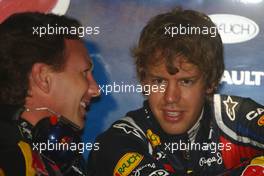 15.04.2011 Shanghai, China,  Christian Horner (GBR), Red Bull Racing, Sporting Director and Sebastian Vettel (GER), Red Bull Racing  - Formula 1 World Championship, Rd 03, Chinese Grand Prix, Friday Practice