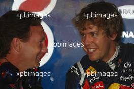 15.04.2011 Shanghai, China,  Christian Horner (GBR), Red Bull Racing, Sporting Director and Sebastian Vettel (GER), Red Bull Racing  - Formula 1 World Championship, Rd 03, Chinese Grand Prix, Friday Practice