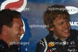 15.04.2011 Shanghai, China,  Christian Horner (GBR), Red Bull Racing, Sporting Director and Sebastian Vettel (GER), Red Bull Racing  - Formula 1 World Championship, Rd 03, Chinese Grand Prix, Friday Practice