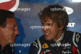 15.04.2011 Shanghai, China,  Christian Horner (GBR), Red Bull Racing, Sporting Director and Sebastian Vettel (GER), Red Bull Racing  - Formula 1 World Championship, Rd 03, Chinese Grand Prix, Friday Practice