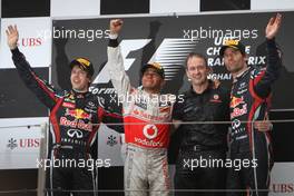 17.04.2011 Shanghai, China,  Sebastian Vettel (GER), Red Bull Racing, Lewis Hamilton (GBR), McLaren Mercedes and Mark Webber (AUS), Red Bull Racing  - Formula 1 World Championship, Rd 03, Chinese Grand Prix, Sunday Podium