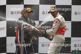 17.04.2011 Shanghai, China,  aSebastian Vettel (GER), Red Bull Racing nd Lewis Hamilton (GBR), McLaren Mercedes  - Formula 1 World Championship, Rd 03, Chinese Grand Prix, Sunday Podium