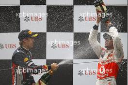 17.04.2011 Shanghai, China,  Sebastian Vettel (GER), Red Bull Racing and Lewis Hamilton (GBR), McLaren Mercedes  - Formula 1 World Championship, Rd 03, Chinese Grand Prix, Sunday Podium